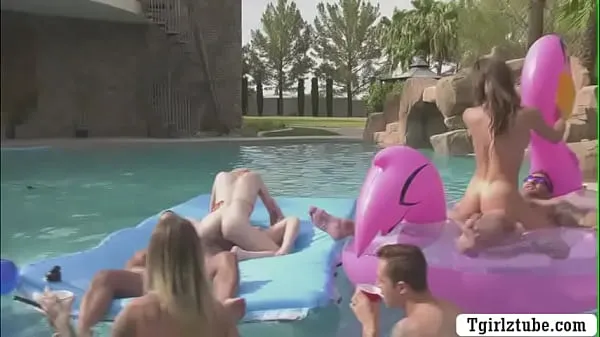 Best Busty shemales are in the swimming pool with many guys that,they decide to do orgy and they start kissing each is,they suck their big cocks passionately and they let them bareback their wet ass too new Movies